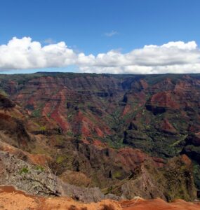Red and green layered cliffs of Waimea Canyon on Kauai, Hawaii