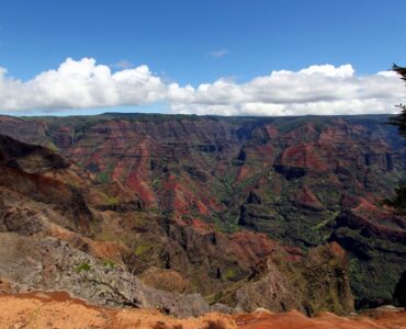Red and green layered cliffs of Waimea Canyon on Kauai, Hawaii