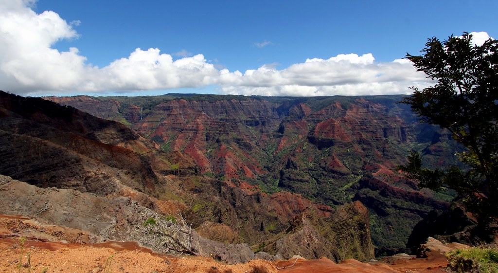 Red and green layered cliffs of Waimea Canyon on Kauai, Hawaii